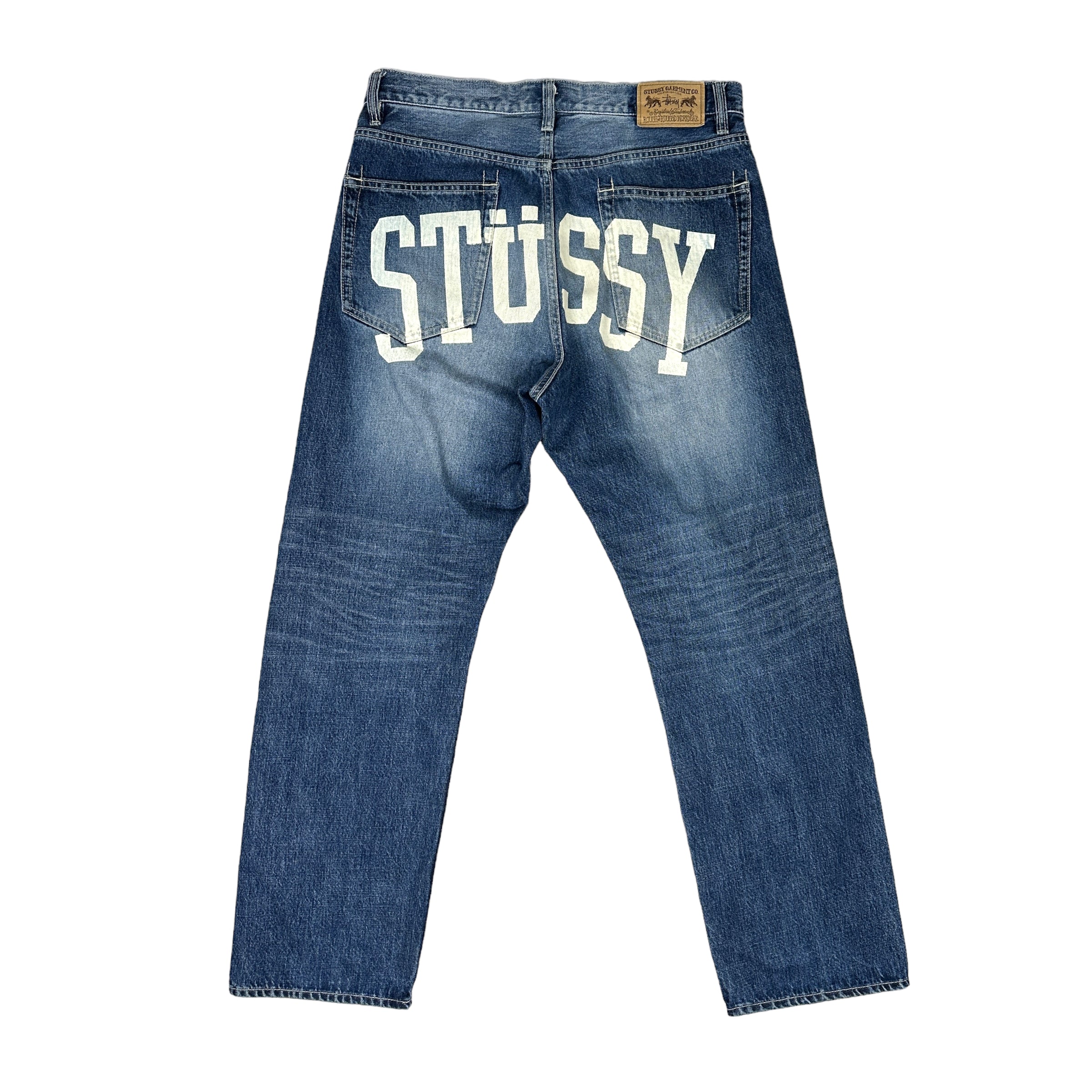 STUSSY BACK ARC SPELLOUT LIGHTWASH JEANS