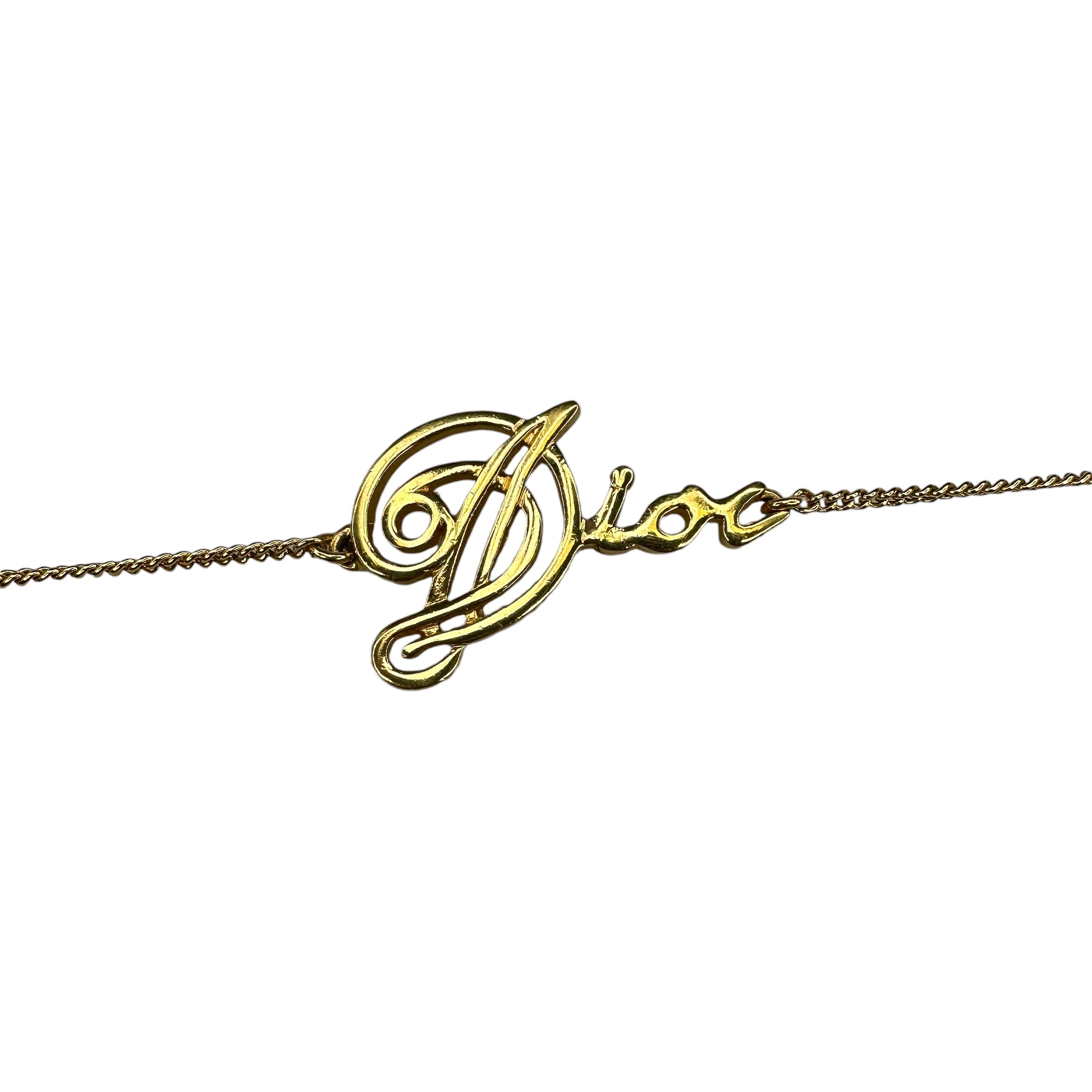 DIOR CURSIVE SPELLOUT PENDANT BRACELET - GOLD PLATED