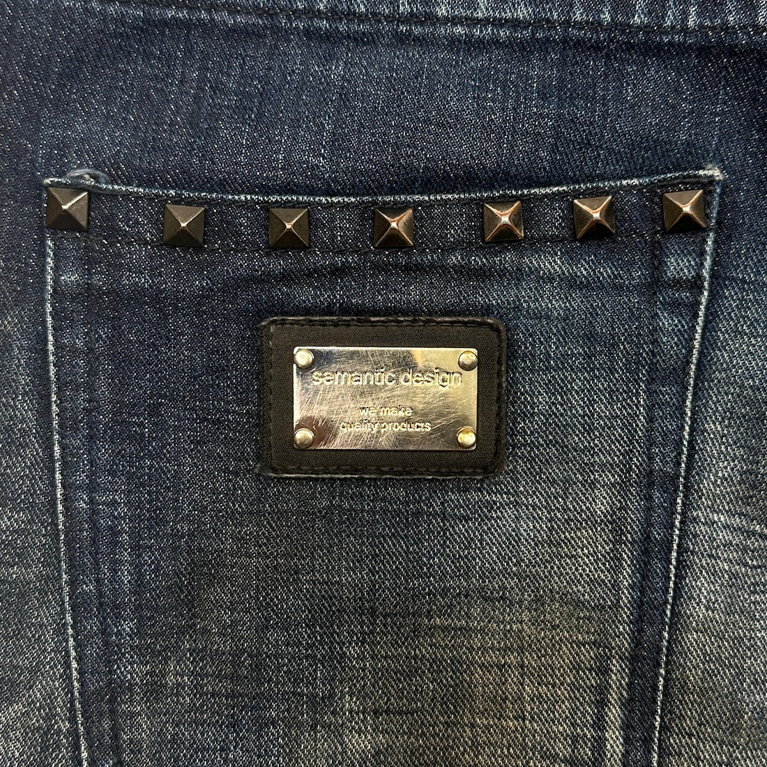 (S) SEMANTIC DESIGN LEATHER ACCENT DENIM