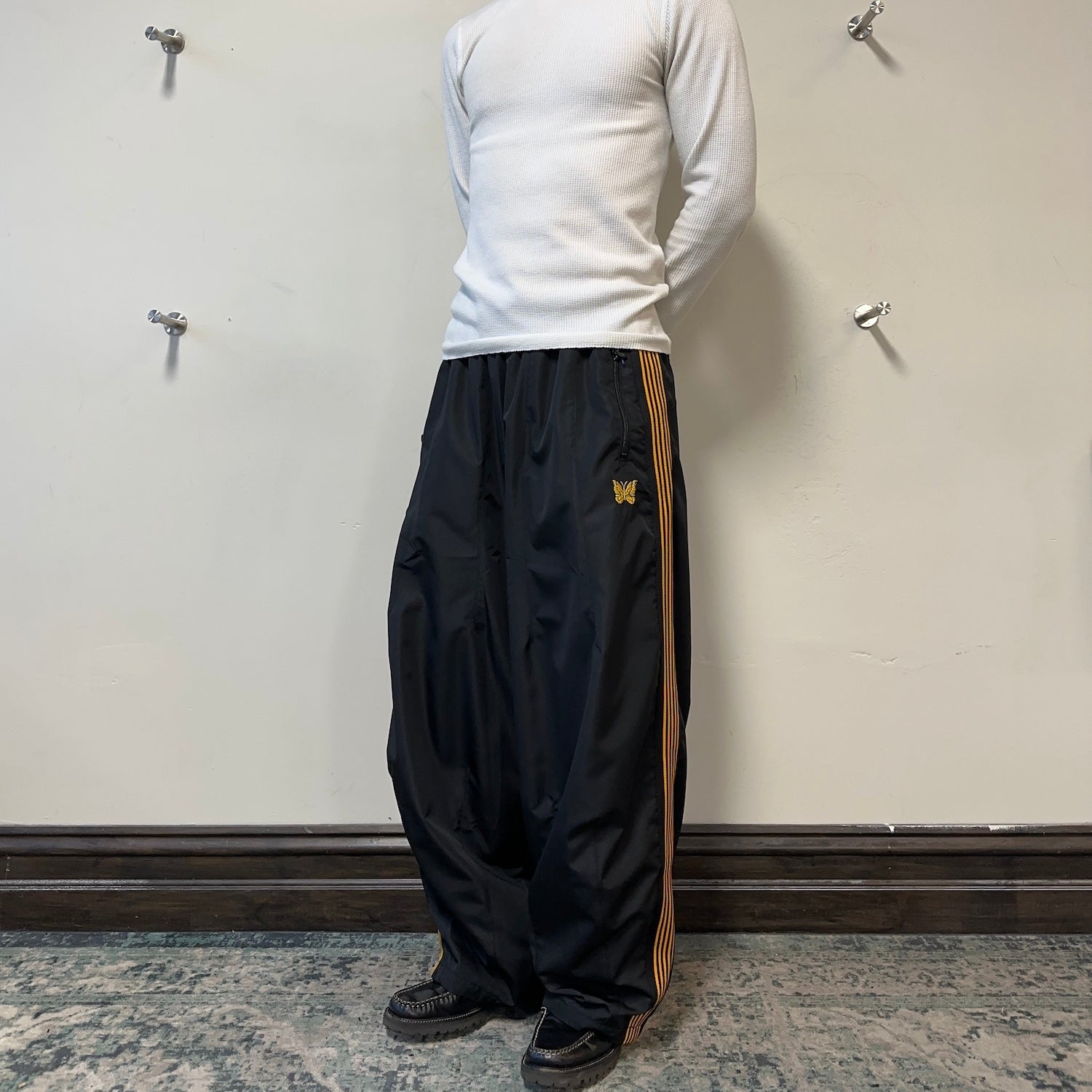 NEW) NEEDLES NYLON H.D TRACK PANTS - BLACK / ORANGE – Top Floor