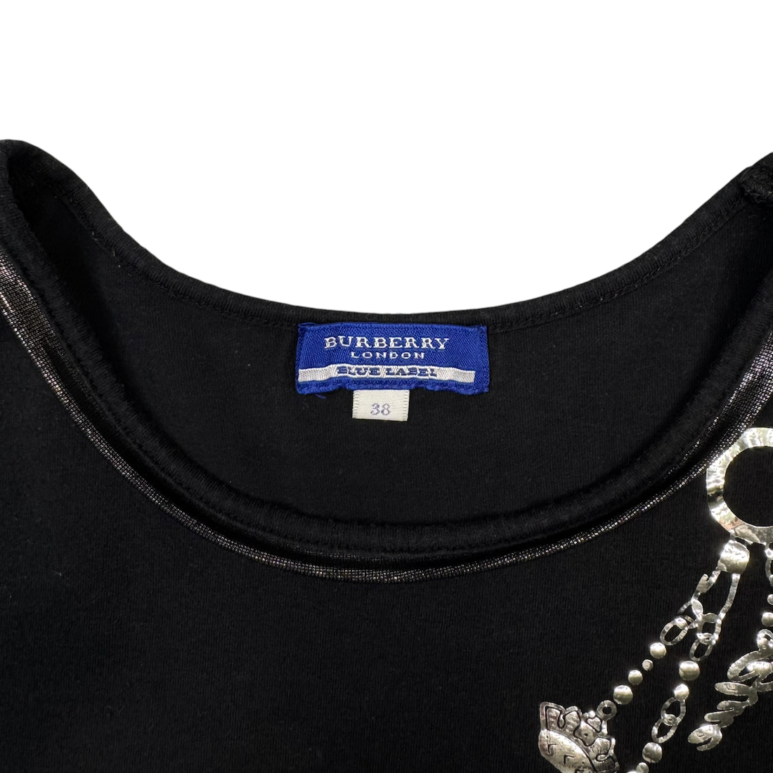 (38) BURBERRY BLUE LABEL CHAIN & CHARM GRAPHIC TOP