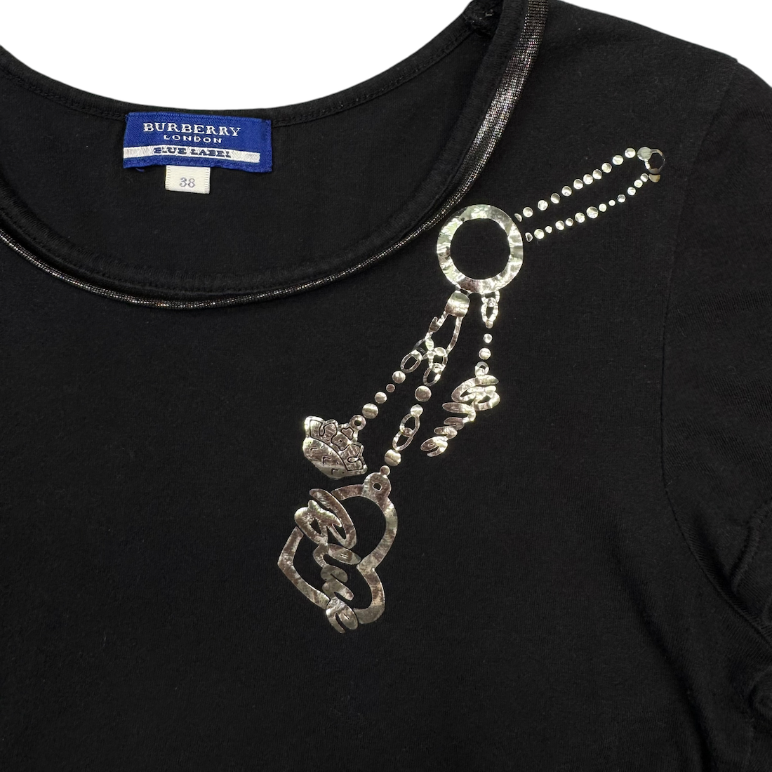 (38) BURBERRY BLUE LABEL CHAIN & CHARM GRAPHIC TOP