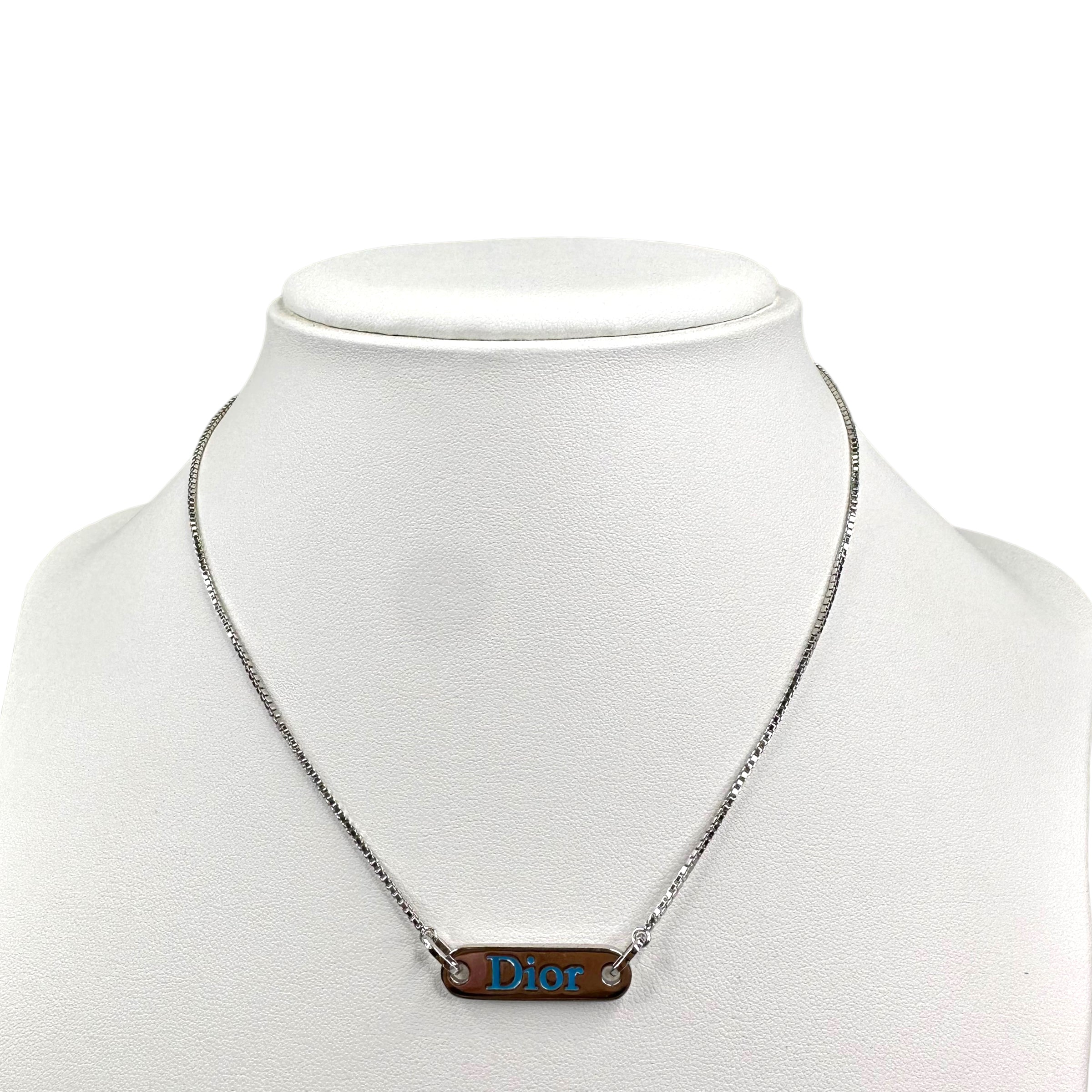 DIOR DEBOSSED PLATE BLUE SPELLOUT NECKLACE SILVER-PLATED