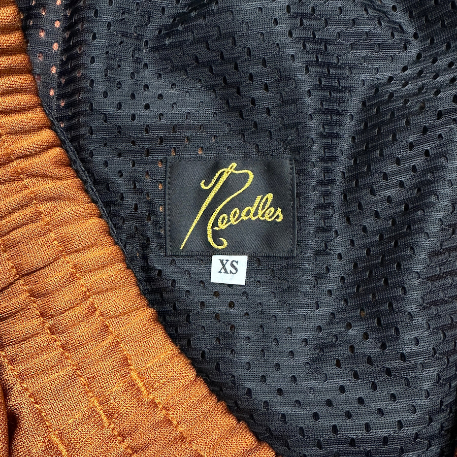 (XS) NEEDLES SS24 RUST H.D TRACK PANTS