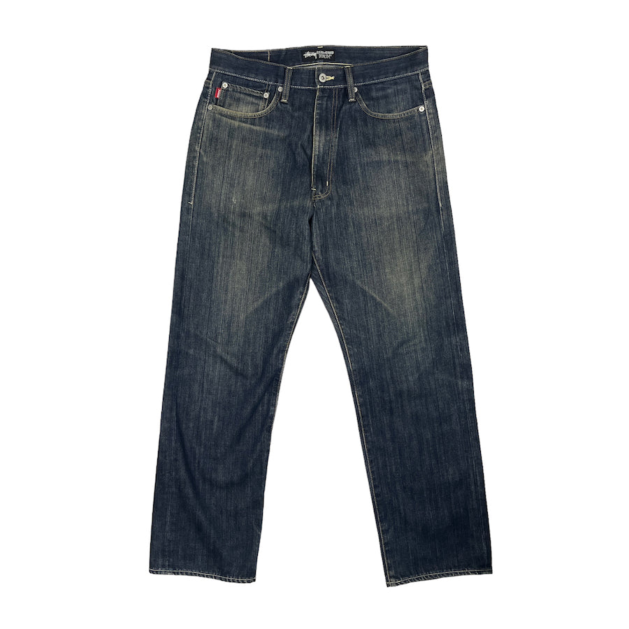(32) STUSSY ROUGH AND RUGGED JEANS