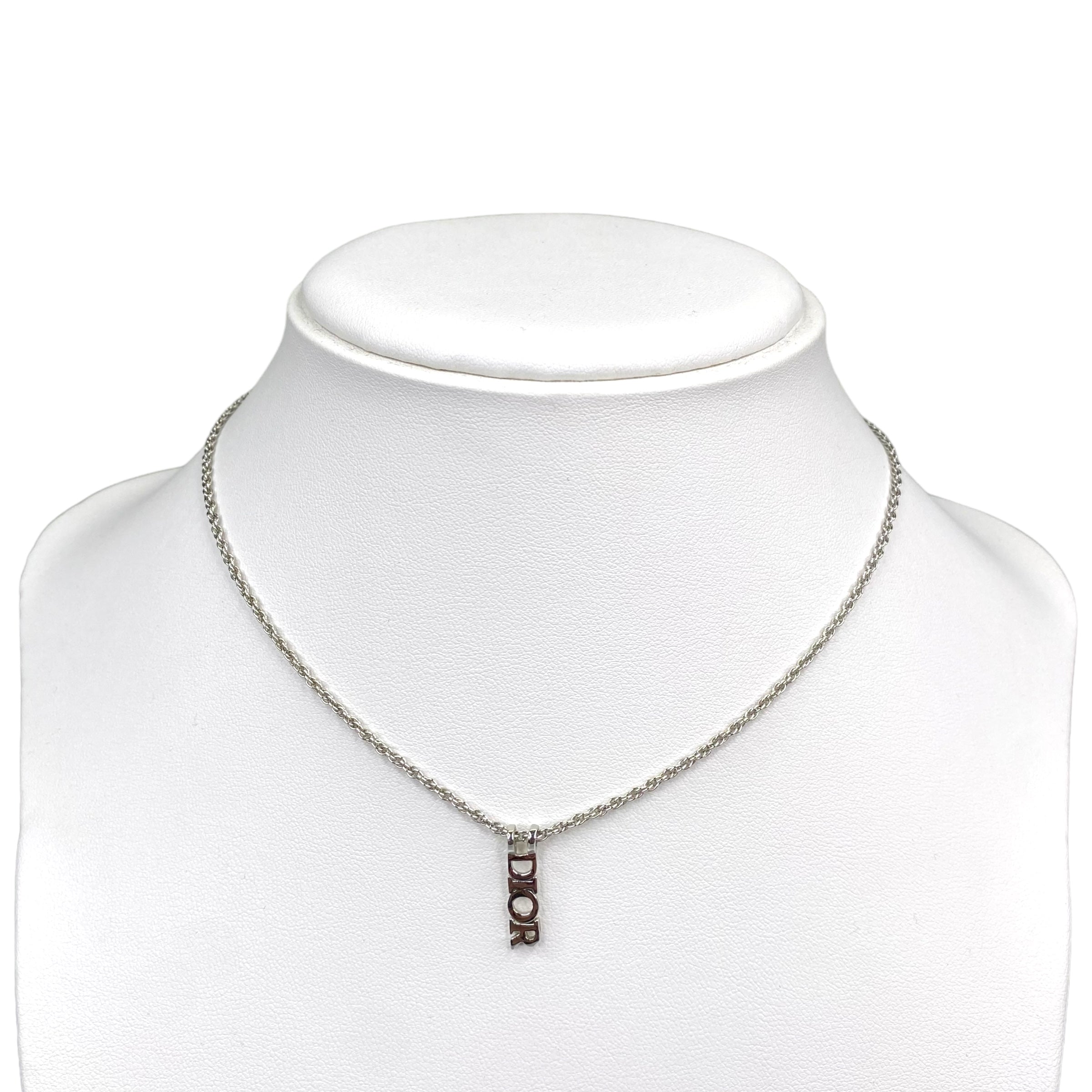 DIOR CAPITAL SPELLOUT PENDANT SILVER PLATED NECKLACE