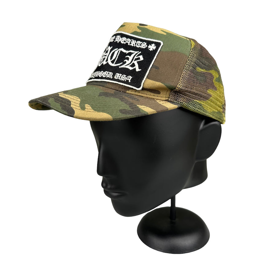 CHROME HEARTS HOLLYWOOD F*CK CAMO TRUCKER HAT