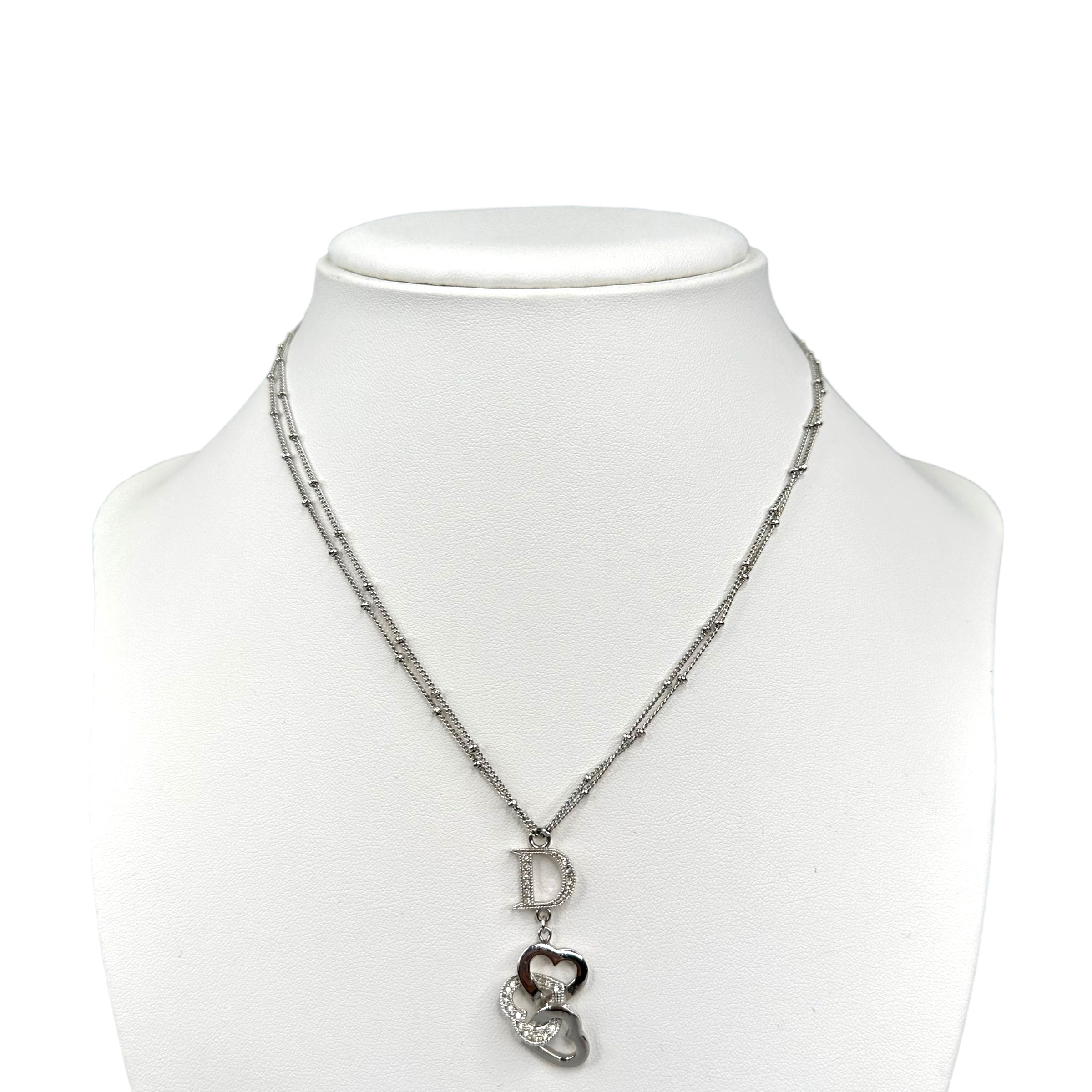 DIOR RHINESTONE "D" AND INTERLOCKED HEARTS SILVER-PLATED NECKLACE