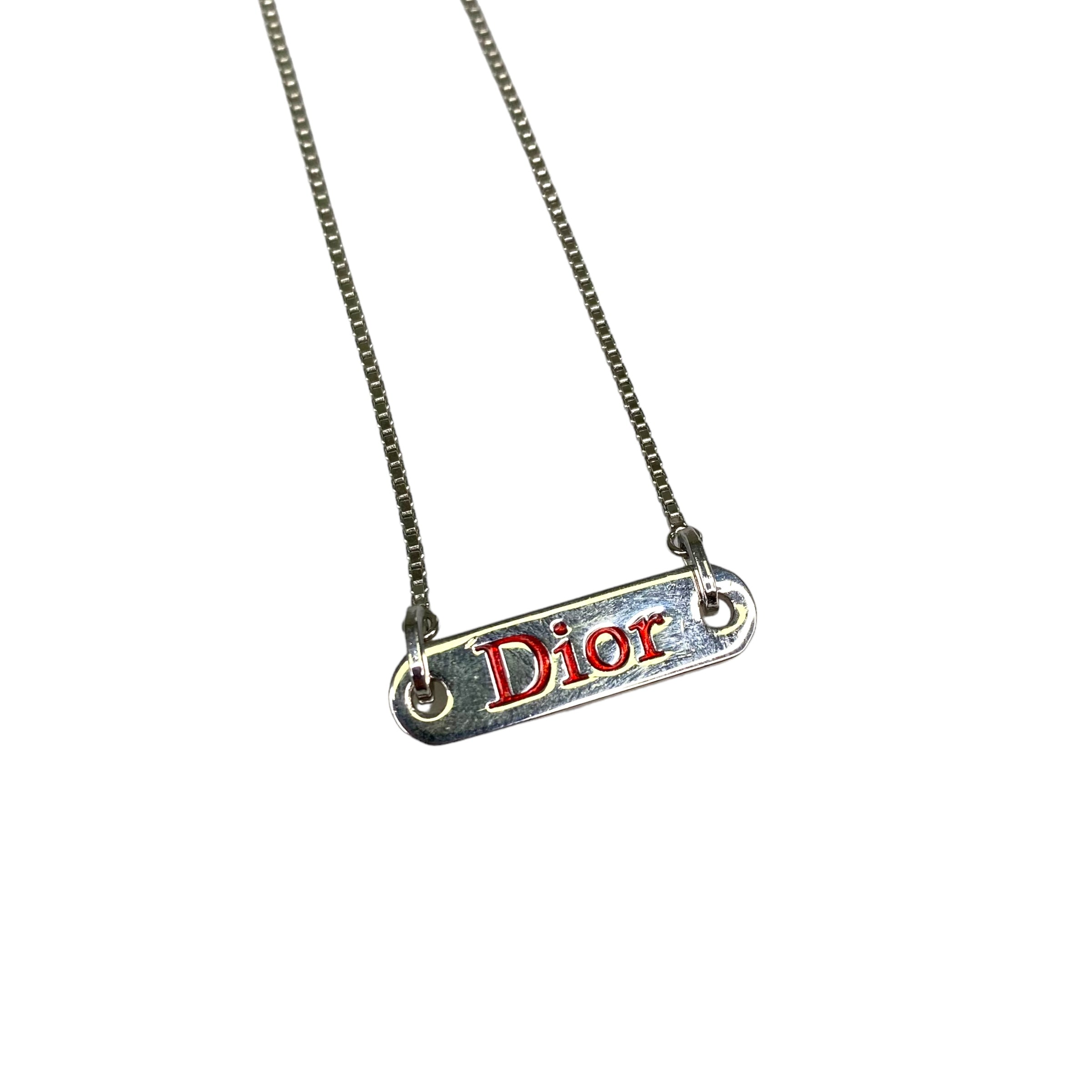 DIOR DEBOSSED PLATE RED SPELLOUT NECKLACE SILVER-PLATED