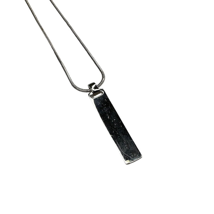 DIOR EMBOSSED SPELLOUT LONG PENDANT NECKLACE