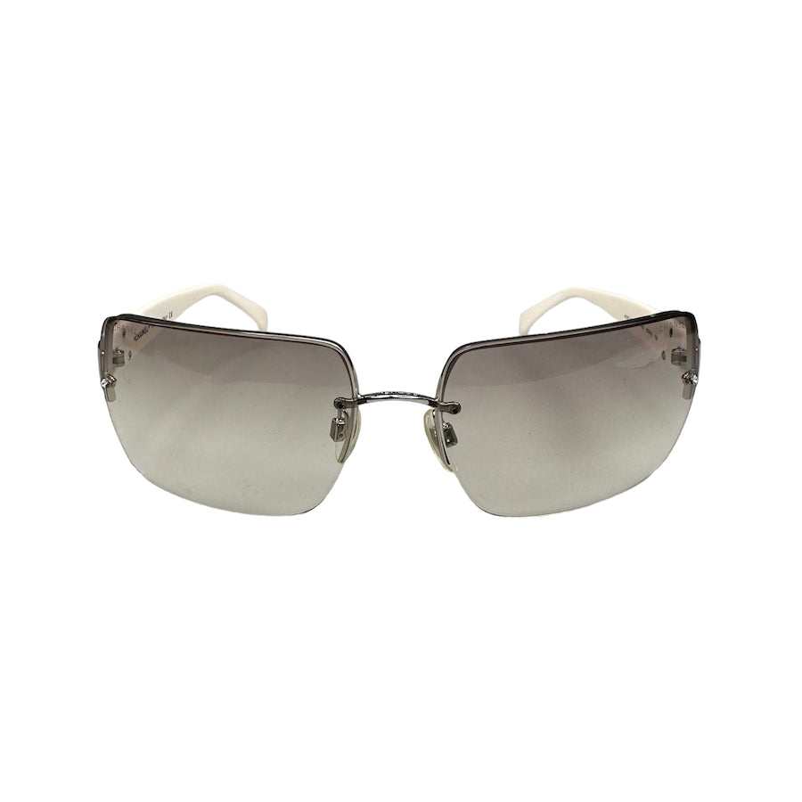 CHANEL RIMLESS LOGO CLEAR TINTED SUNGLASSES