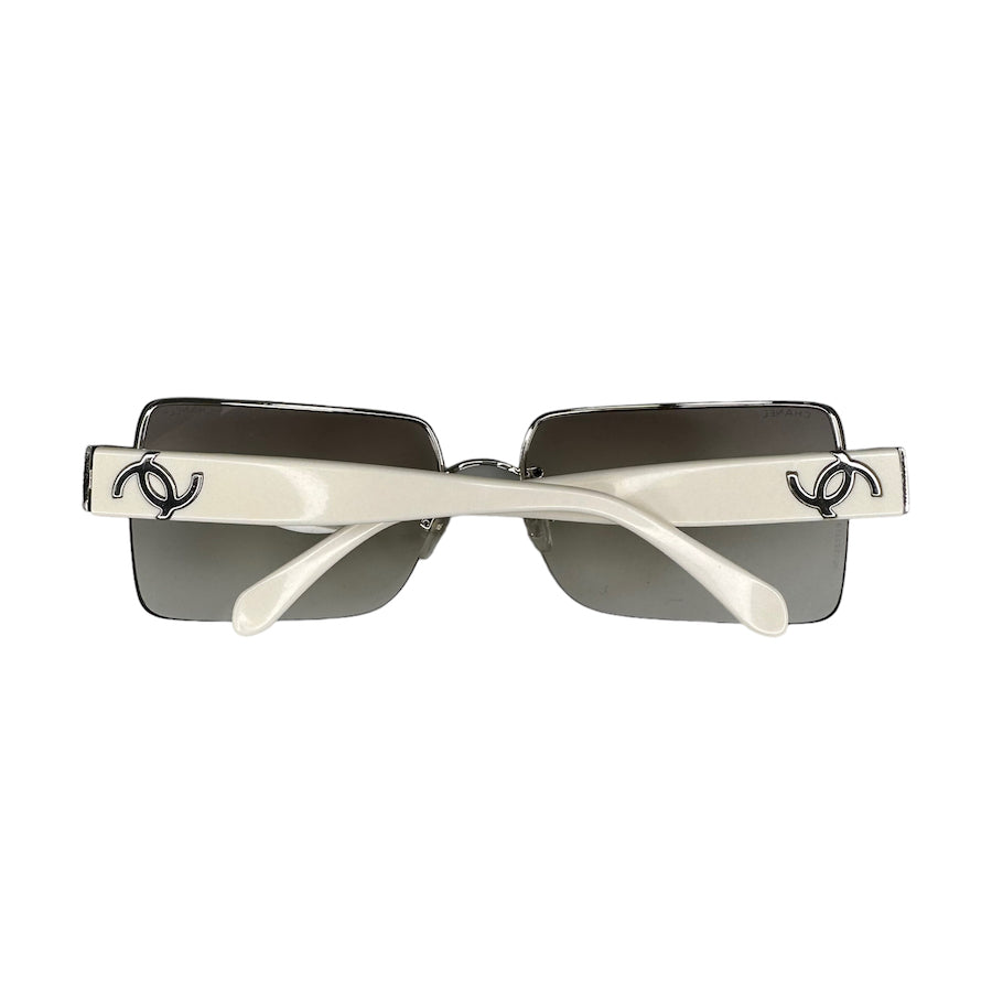 CHANEL RIMLESS LOGO CLEAR TINTED SUNGLASSES