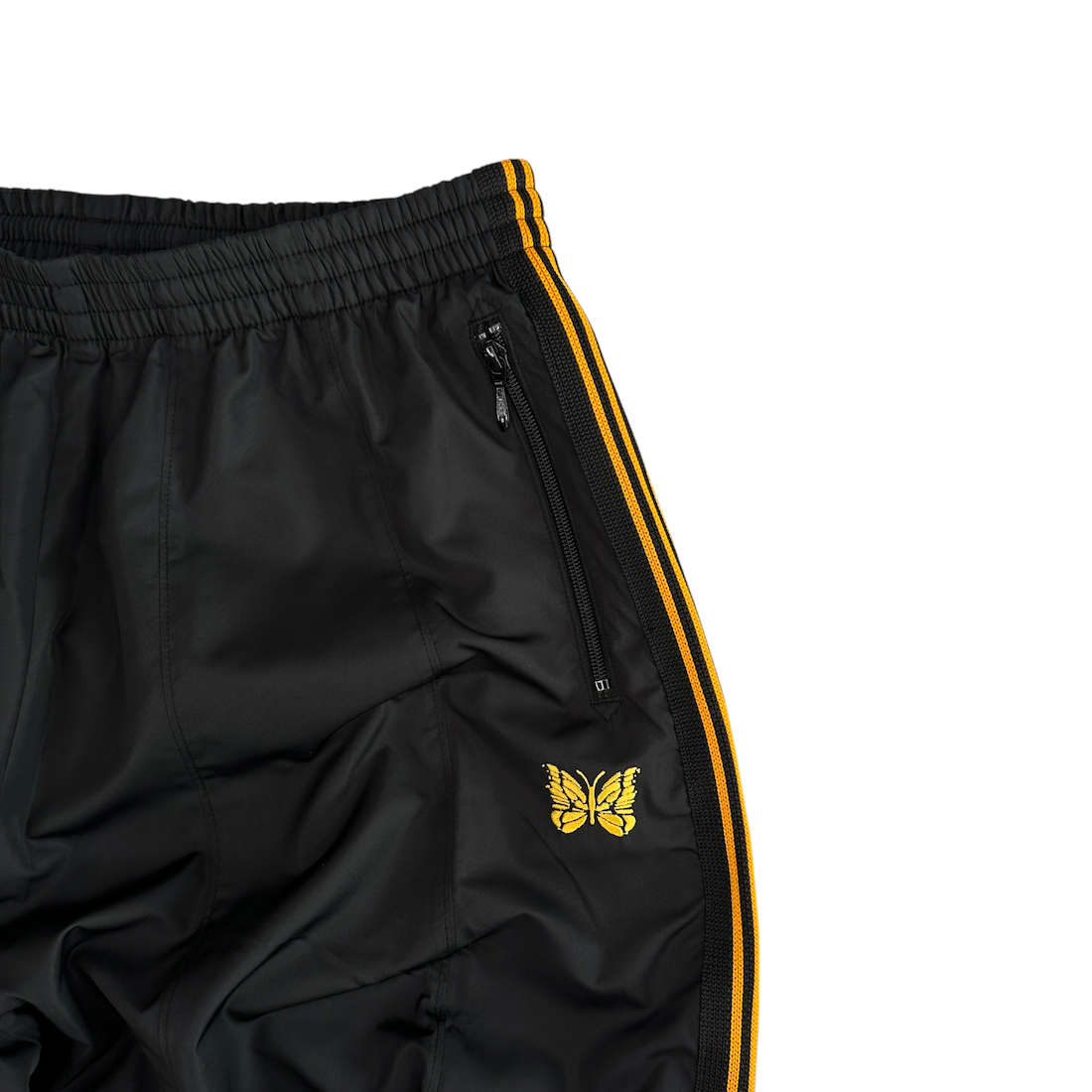 (NEW) NEEDLES NYLON H.D TRACK PANTS - BLACK / ORANGE
