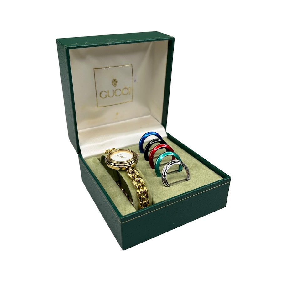 GUCCI GOLD INTERCHANGEABLE BEZEL WATCH