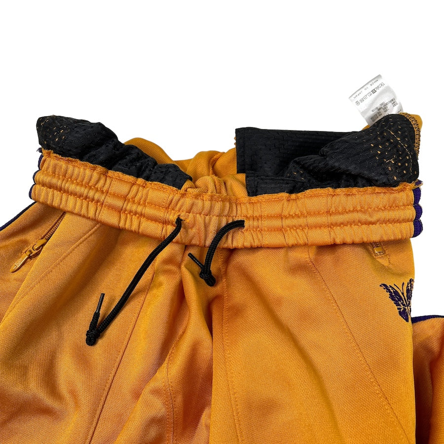 NEEDLES SS22 H.D TRACK PANTS - ORANGE/PURPLE Y3G